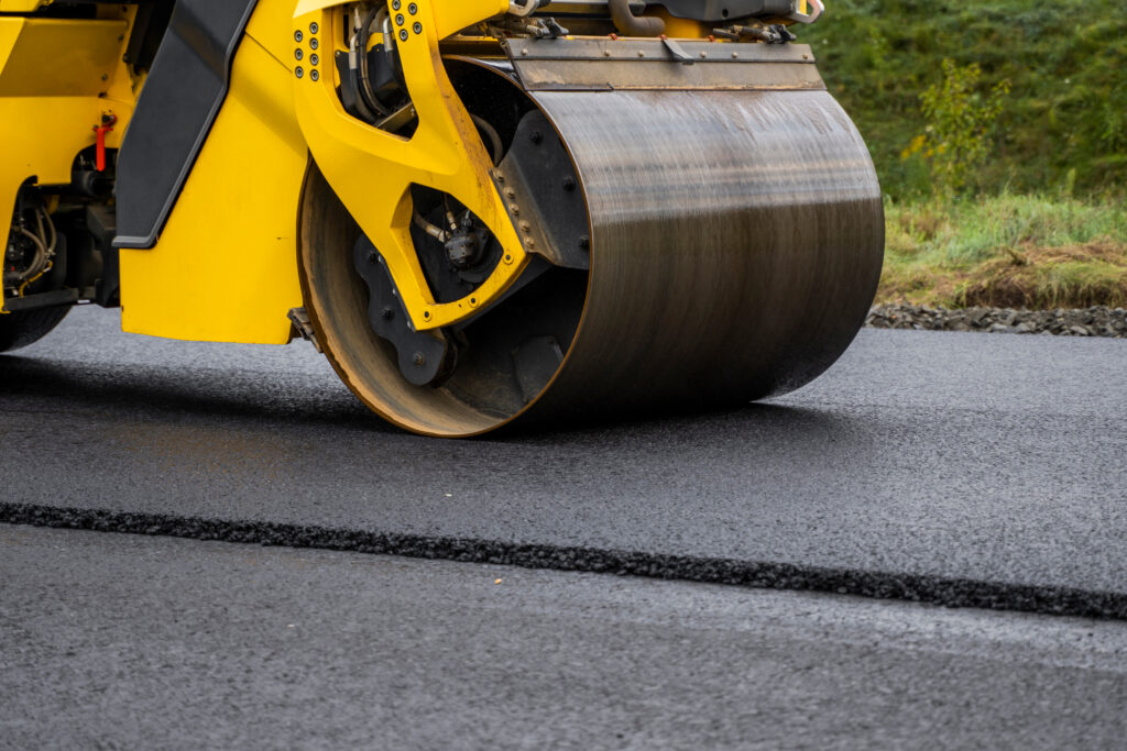 All-Site Restoration Excavating and Paving: Paving the road